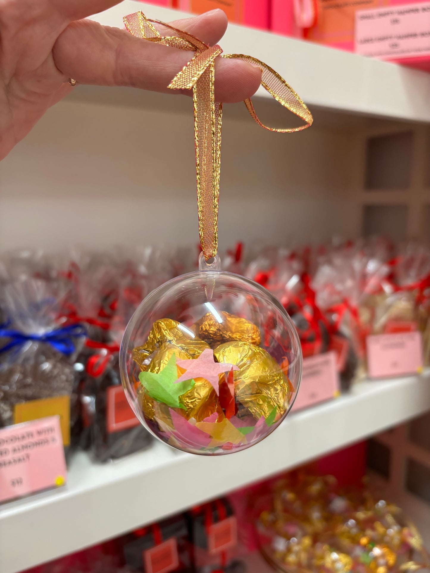 A Chocolate Bauble filled with 5 Gold Stars