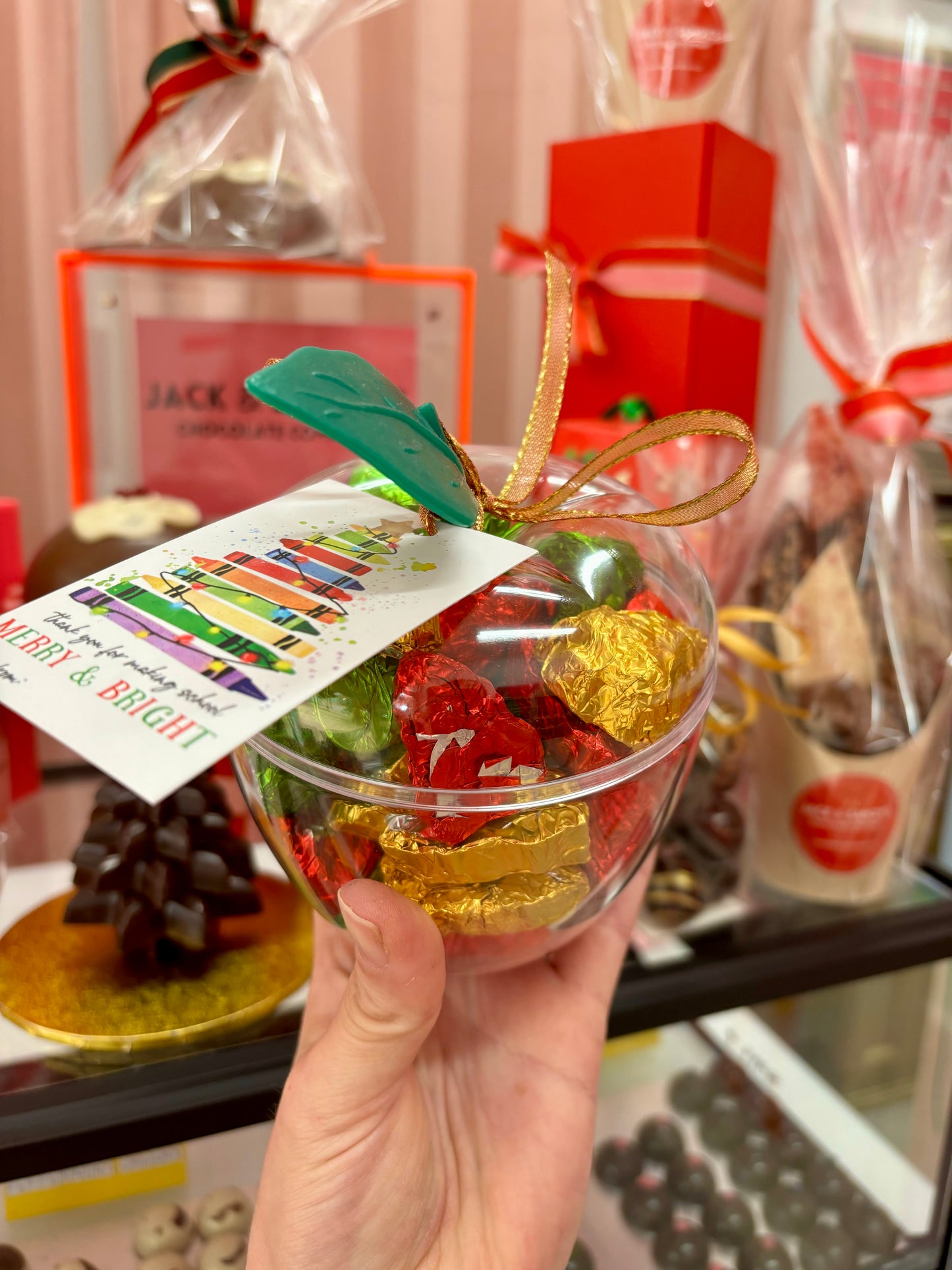 Giant apple filled with solid Christmas chocolates